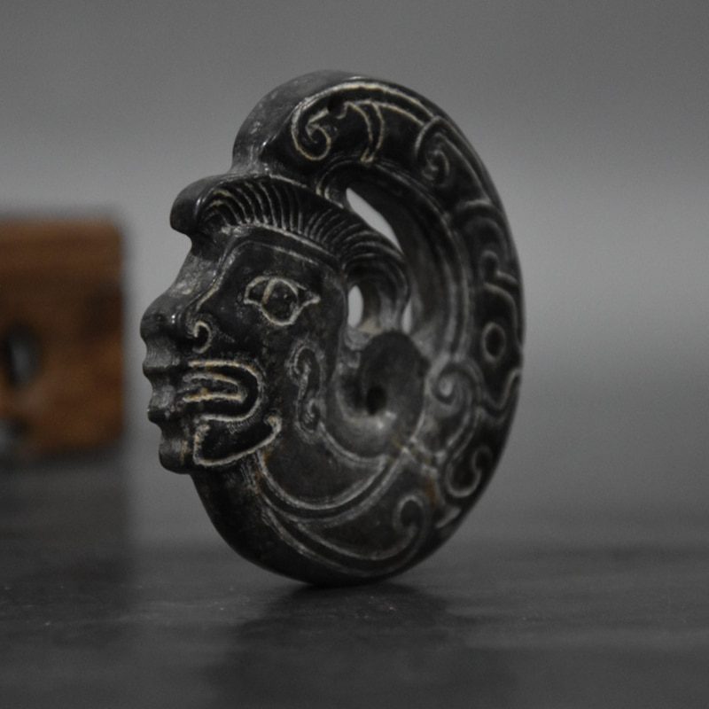 Tibet Hongshan Culture Natural Meteorite Face Sun God Carving Mascot Collection Pendant Accessories Decoration Gift Figurines